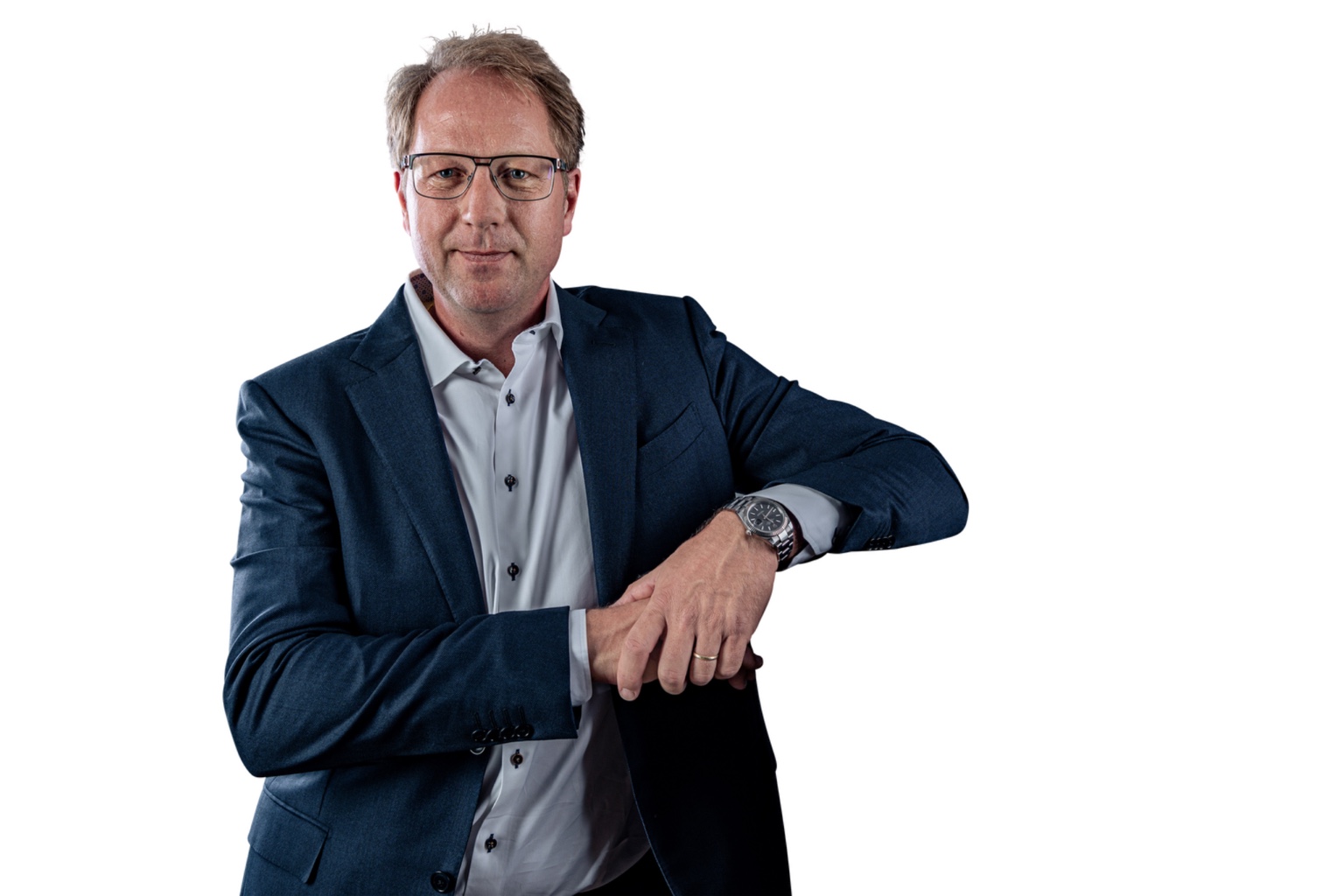 Claus M. Welles im dunklen Anzug